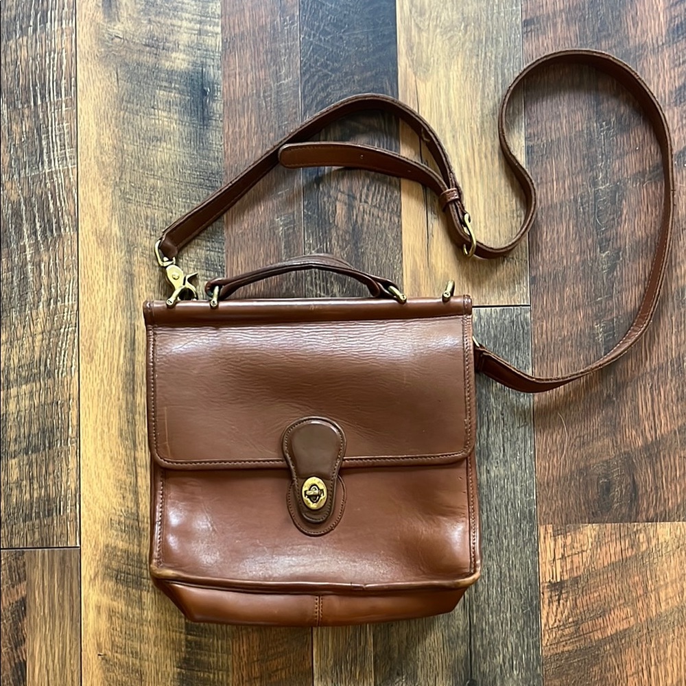 Coach Brown Leather Messenger Bag with Adjustable Strap and Turn-Lock Closure